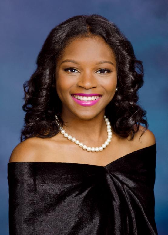 Senior  portrait on mottled blue