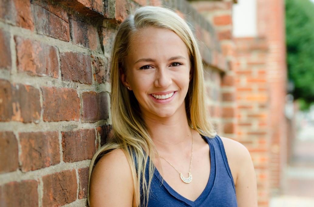 Casual senior portrait outside of studio in Richmond VA