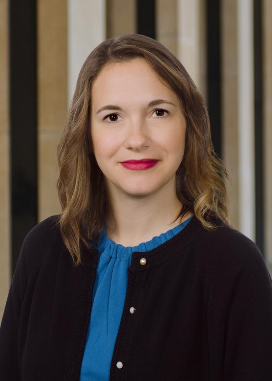 Environmental head shot with library architecture dropped in