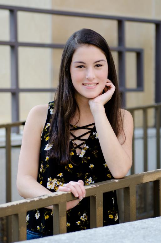 Casual senior portrait outside of studio in Downtown Richmond